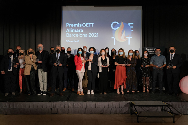 CETT award night attendees standing on stage at the Barcelona event.