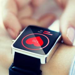 Smart watch with heart icon on screen
