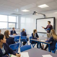 Teacher with students in classroom
